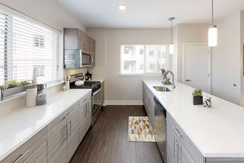 Lansdale Station Apartments wood grain cabinetry